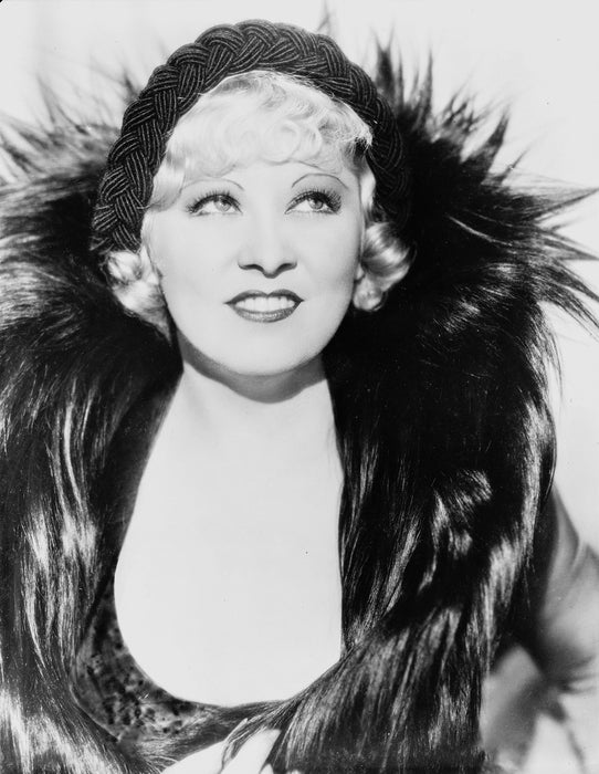 Mae West in Feather Dress