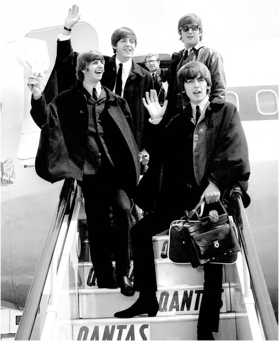 The Beatles arriving in London